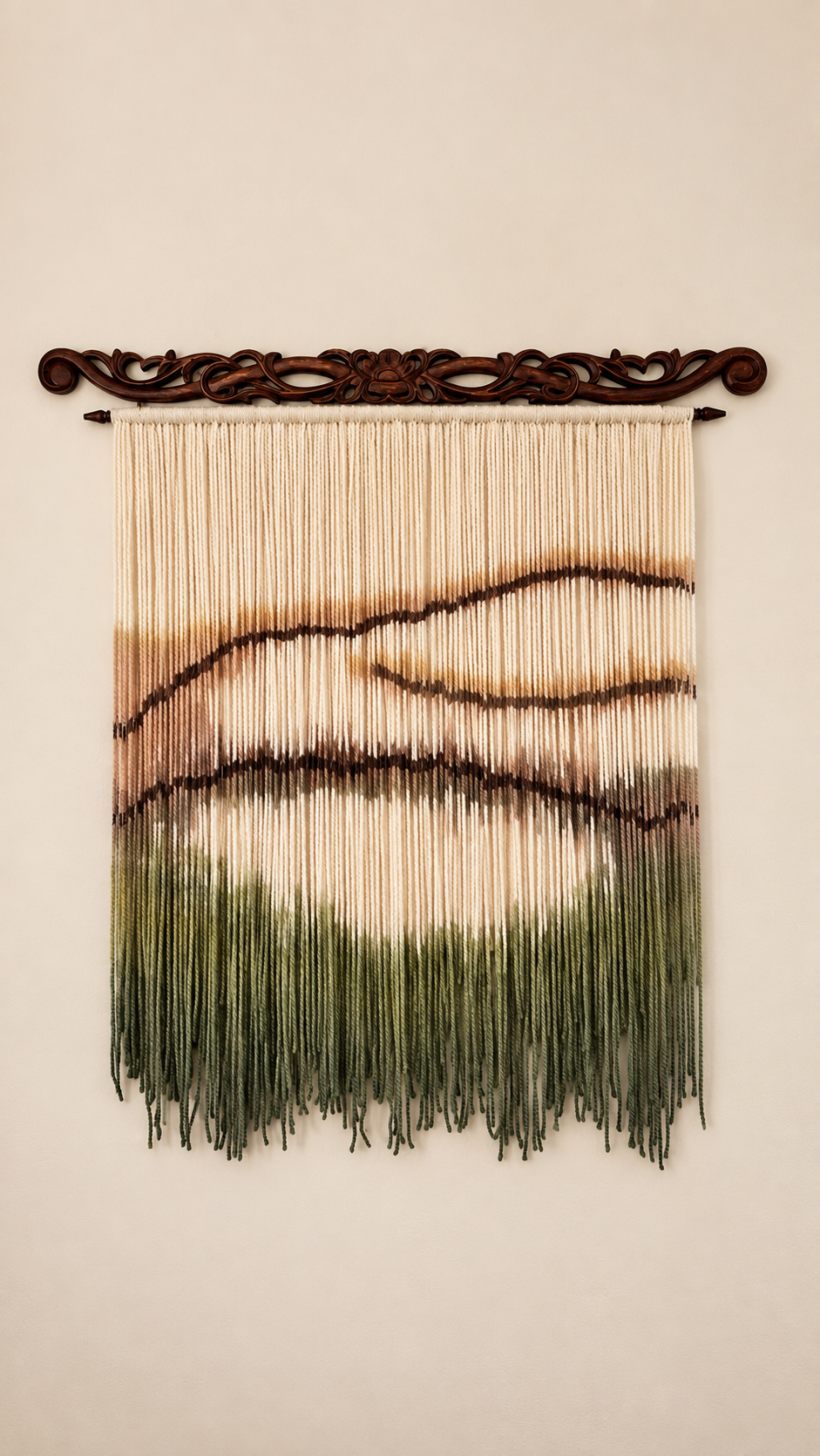 Handmade alpaca wool wall hanging in ivory brown and olive green with carved dark wood rod displayed in an organic modern interior