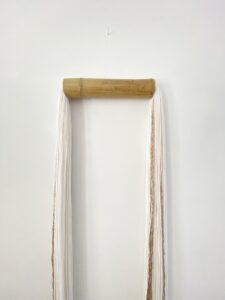 White & golden tassel / bamboo