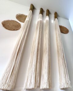 Single bamboo and wool fiber art wall module designed for custom interior installations in hotels and professional design projects