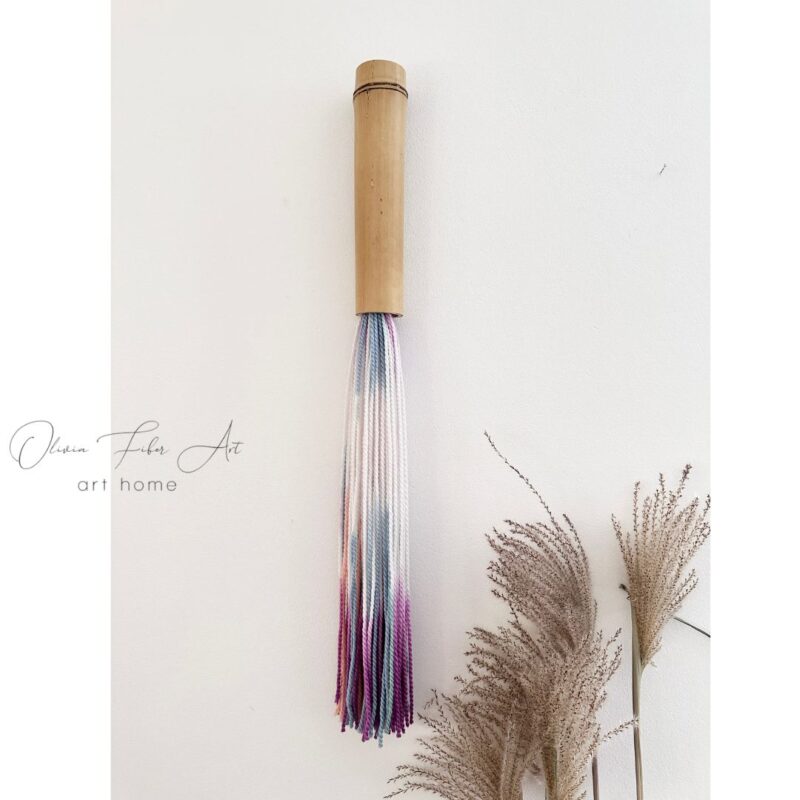 Single tassel hanging on the wall / mix color