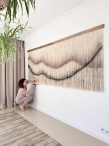 A truly oversized 108” hand-dyed wool wall hanging designed as a luxury statement piece for modern interiors. This one-of-a-kind fiber artwork transforms large walls into architectural focal points.